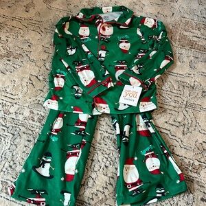 NWT Carter’s Santa 4T pjs. Two pieces with button up top.